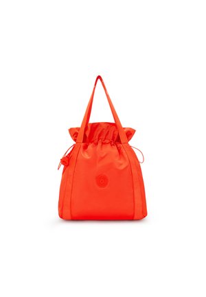 Orange nylon drawstring bag with contrasting shoulder straps and a circular logo on the front. Smooth texture and rounded silhouette.
