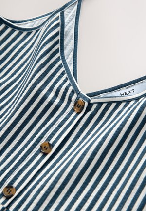 Canotta a righe navy e bianca con scollo a V, caratterizzata da cinque bottoni marroni sul davanti e un tessuto morbido e strutturato. Etichetta del marchio visibile.