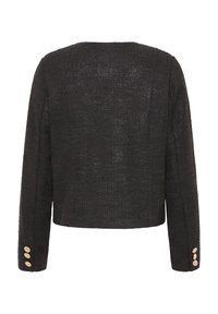 Giacca corta nera con tessuto strutturato, caratterizzata da una sottile lucentezza. Maniche lunghe con tre bottoni dorati su ogni polsino.