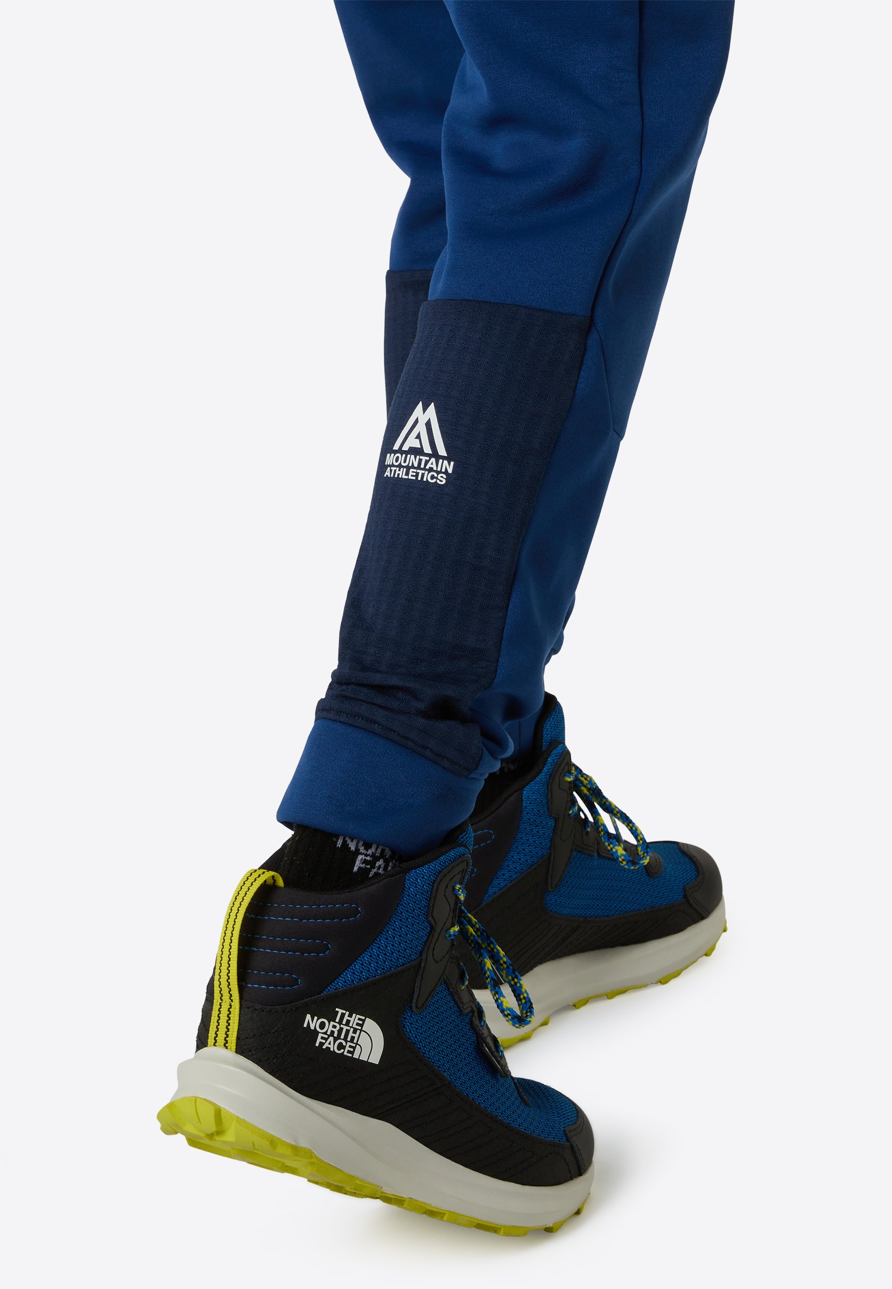 The North Face MOUNTAIN ATHLETICS - Tracksuit bottoms - estate