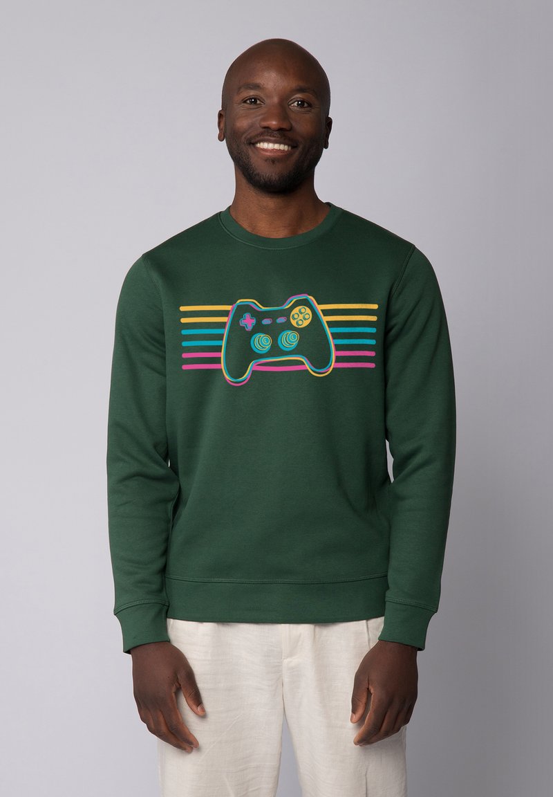 Green sweatshirt with a video game controller graphic in bright colors, featuring horizontal stripes in pink, yellow, and blue.