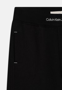 Calvin Klein Jeans WAISTBAND - Pantaloni sportivi - black