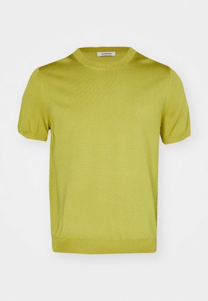 T-shirt a maniche corte in un vivace verde lime, con collo rotondo e polsini e orlo a costine, realizzato in un tessuto morbido e leggero.