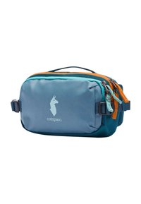 Borsa a tracolla Cotopaxi in blu con accenti in teal. Presenta cerniere arancioni, tracolla regolabile e logo lama nella parte anteriore. Tessuto resistente.