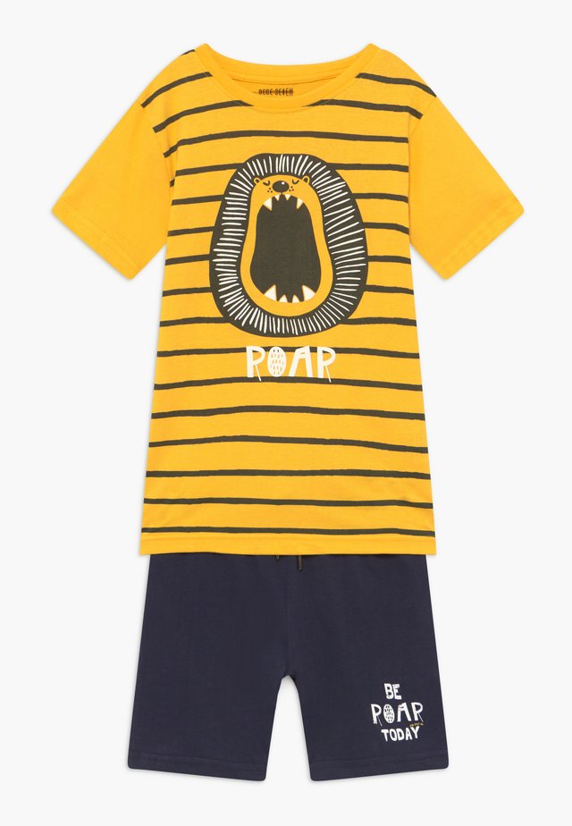 SET - Pantaloni sportivi - yellow