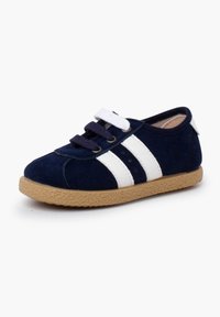Navy blue suede shoe with white stripes, round toe, and rubber sole. Features purple laces and a small white heel tab.