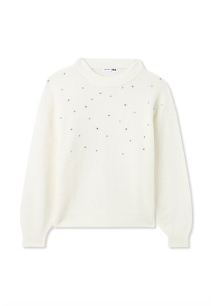 Maglione color crema con scollatura rotonda e maniche lunghe. Presenta dettagli metallici sparsi. Realizzato in un morbido tessuto testurizzato.
