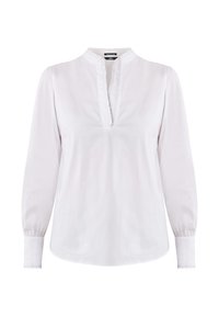 Blusa bianca a maniche lunghe con colletto alla mandarino, caratterizzata da una patta arricciata e polsini arricciati, realizzata in tessuto leggero.