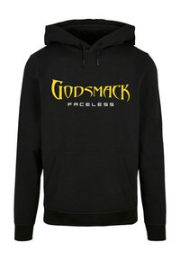 Crna dukserica s kengurufrontom i kapuljačom sa vezicom. Na prednjoj strani je natpis u žutoj i bijeloj boji "GODSMACK FACELESS".