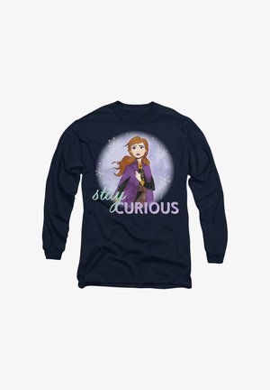 Navy long-sleeve shirt featuring a cartoon character with brown hair, wearing a purple cape and a black outfit with a yellow tie, text "stay CURIOUS."