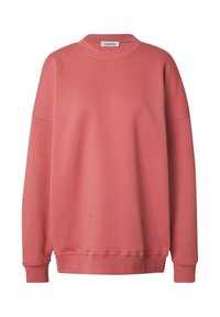 Roze sweatshirt met een ribbelboord bij de ronde hals en lange mouwen. Zachte textuur en een relaxte pasvorm. Heeft een gestikte zoom en boorden.