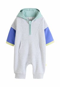 Szürke kapucnis overál menta zöld kapucnival, rövid kék ujjal és sárga díszítéssel. Elől zsebbel és bordázott mandzsettával rendelkezik. Puha anyagból készült.