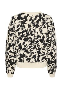 Sweat-shirt beige à manches longues avec motif animal abstrait noir, poignets et ourlet côtelés, vu de dos.
