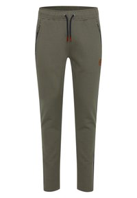 Olive green jogger pants with a drawstring waist, side zip pockets, and navy blue side panels. Smooth fabric with a fitted design.
