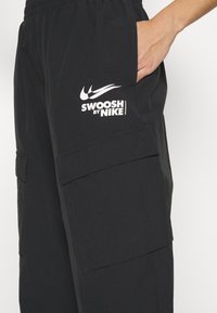 Nike Sportswear Pantalones cargo - black