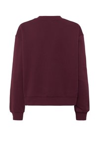Felpa bordeaux con collo rotondo, maniche lunghe e polsini e orlo a costine, caratterizzata da una texture liscia e un design semplice.