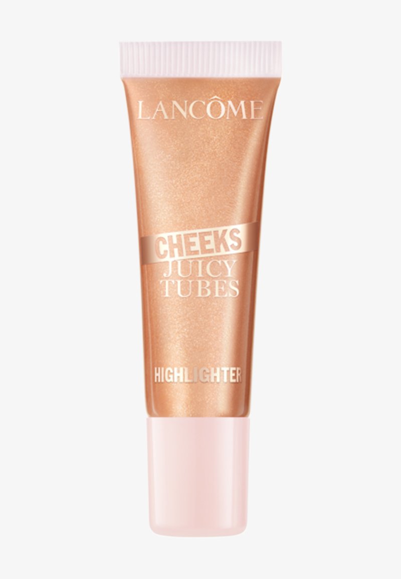 Enlumineur Lancôme Cheeks Juicy Tubes dans un tube brillant rose gold avec un bouchon rose pâle sur fond blanc.