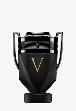 Schwarzer matter Pokal mit zwei Griffen, einem goldenen Buchstaben "V" auf der Vorderseite und einem kleinen Sensor oder Knopf über dem Buchstaben.