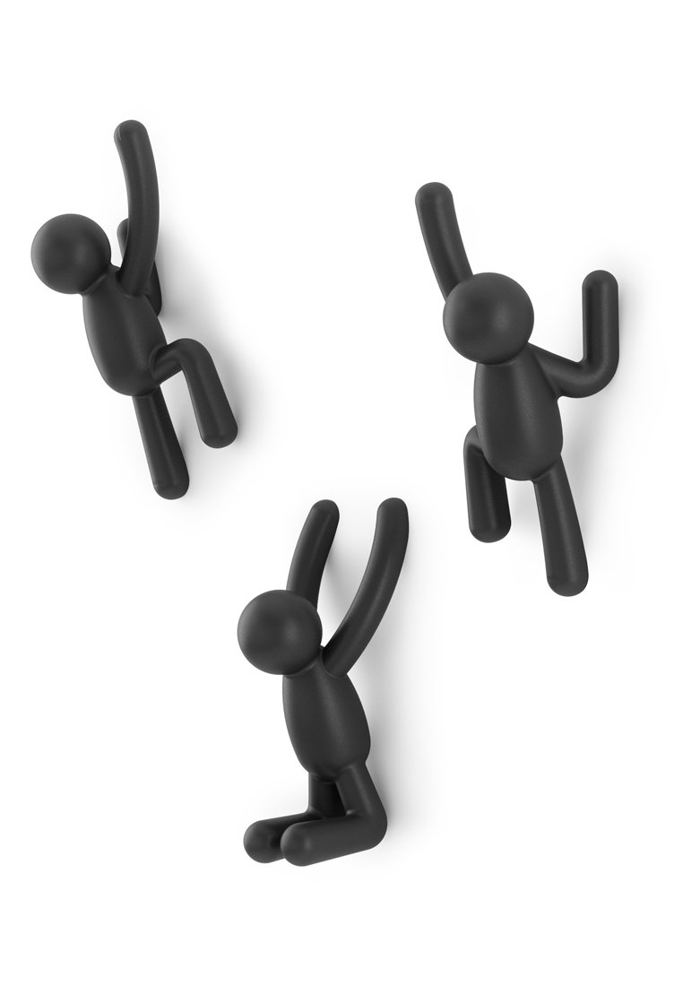 Ganci da parete in plastica nera a forma di figure umane giocose, con le braccia alzate, in tre pose distinte, con una superficie liscia e opaca.