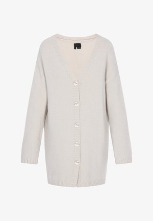 Heledhalli kardigan, millel on V-kaelus, pikad varrukad ja esipaneelil ümmarguste nuppudega nööpidelukud. Kootud tekstuur, vabalt istuv.