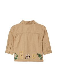 Khaki koszula z guzikami, z podwiniętymi rękawami, z kolorowymi haftami przedstawiającymi zwierzęta (żyrafa, zebra, lew) oraz wzorami roślinnymi na dole.