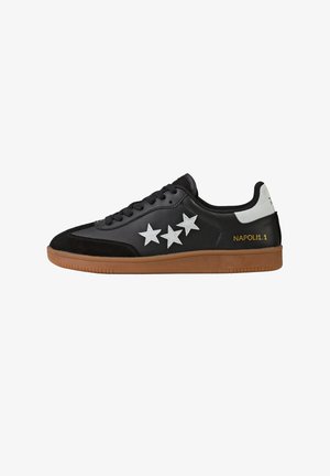 Black low-top sneaker with three white star accents, brown sole, white heel tab, and "NAPOLI 1.1" text in gold on the side.
