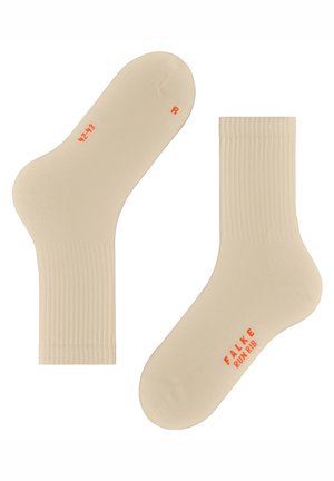 Beige enkelsokken met ribbelstructuur. Bevat oranje tekst die de maat en het merk aangeeft, met een glad en zacht materiaal.