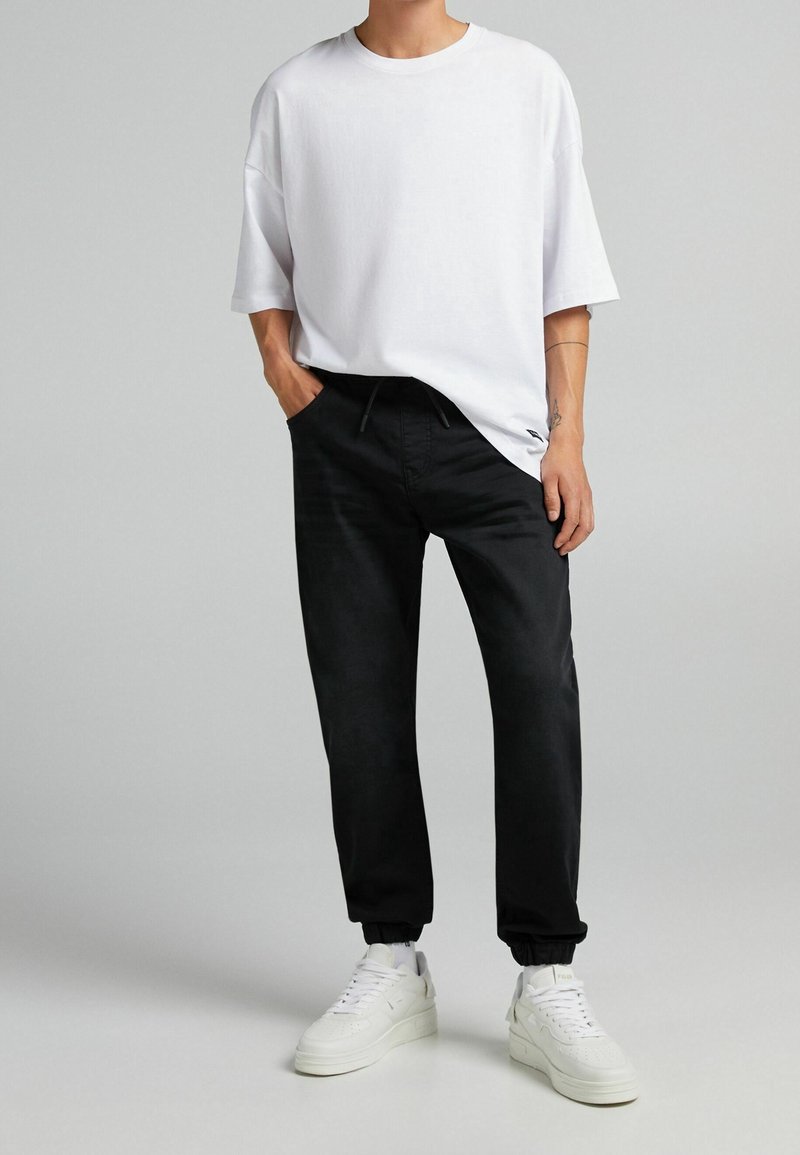 Bershka Uomo Pantaloni Bianchi E Neri Bershka Bershka Jeans Baggy