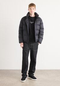 Calvin Klein PUFFER - Dunjakker - black