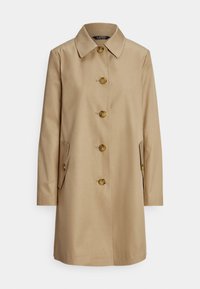 Beige trenchcoat med krage, sex guldknappar, sidofickor och långa ärmar. Slät tyg med skräddarsydd design.