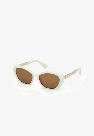 White plastic sunglasses with brown lenses, cat-eye shape, smooth texture, and metal accents on the temples.