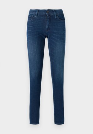 Jeans skinny blu scuro in denim, con chiusura frontale a bottone, passanti per cintura e cinque tasche. Texture liscia con leggero sbiadimento.
