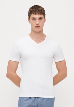White short-sleeve V-neck t-shirt made from soft fabric, featuring a fitted shape and smooth texture, without any patterns or accents.