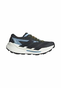 Chaussure de trail running noire et grise avec une tige en mesh texturé, comprenant des accents bleus, des bandes réfléchissantes et une semelle intermédiaire blanche épaisse.