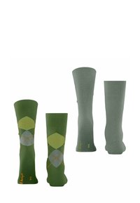 Due coppie di calzini verdi sono esposte. Una coppia presenta un motivo argyle, mentre l'altra ha un design verde uniforme.