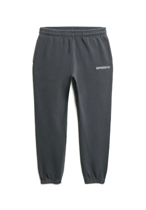 Pantaloni sportivi grigio scuro in misto cotone, con vita elasticizzata, tasche laterali e logo bianco "SUPERDRY" sulla coscia sinistra.