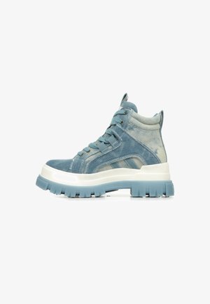 High-top sneakers made of denim with a light blue color, featuring a thick white sole and textured accents. Laces and padded collar included.