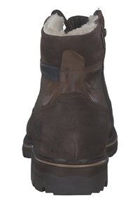 Brown leather ankle boot with soft, white lining, rear zipper, durable sole, and subtle texture variations on the upper material.