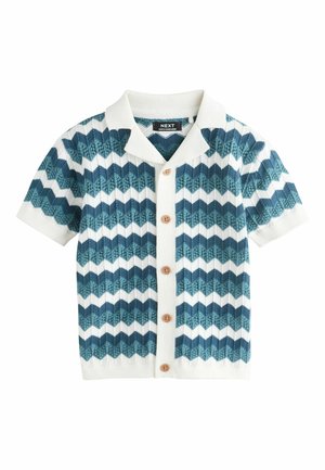 Trumpomis rankovėmis megztinis su sagomis, mėlynos ir baltos zigzago rašto, medinės sagos ir baltos apykaklės.