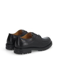 Chaussures en cuir noir avec une finition lisse, bout rond et design à lacets. Semelle en caoutchouc épaisse avec un profil texturé pour une bonne adhérence et durabilité.
