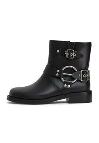 Botines camperos - black