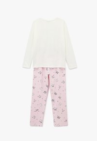 Weißes Langarmshirt mit rundem Ausschnitt; pinkfarbene Hose mit schwarzen Konturen von Tiermotiven und Schleifen, aus weichem Baumwollstoff, entspannte Passform.