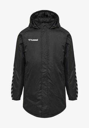Giacca sportiva nera con chiusura zip, design imbottito, polsini elasticizzati e strisce riflettenti sulle maniche. Logo Hummel sul petto.