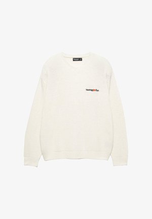 V-hals trui van crèmekleurige gebreide stof. Bevat een klein zwart en oranje logo op de borst. Lange mouwen en een geribbelde zoom.