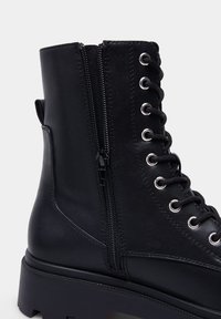 Springfield Stivaletti con plateau - black