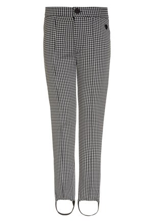 Pantalon à motif pied-de-poule noir et blanc avec fermeture par boutons et brides aux chevilles.