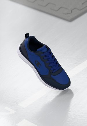 Blue athletic shoe with a textured upper, lace-up design, and rubber outsole. Features a contrasting dark accent and a pull tab at the heel.