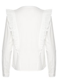 White long-sleeve shirt with a round neckline and ruffle accents along the shoulders. Smooth cotton texture; fitted design with button cuffs.