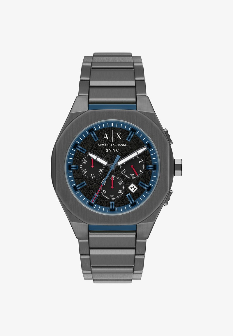 Montre en acier inoxydable avec un boîtier hexagonal, un cadran texturé noir, des accents bleus, des sous-cadrans et une fenêtre de date. Bracelet de couleur argentée.