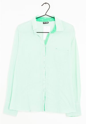 Jasnozielona koszula w mały wzór w kratkę, długie rękawy, z przodem na guziki, pojedyncza kieszeń na piersi i kontrastujący zielony wewnętrzny kołnierzyk.